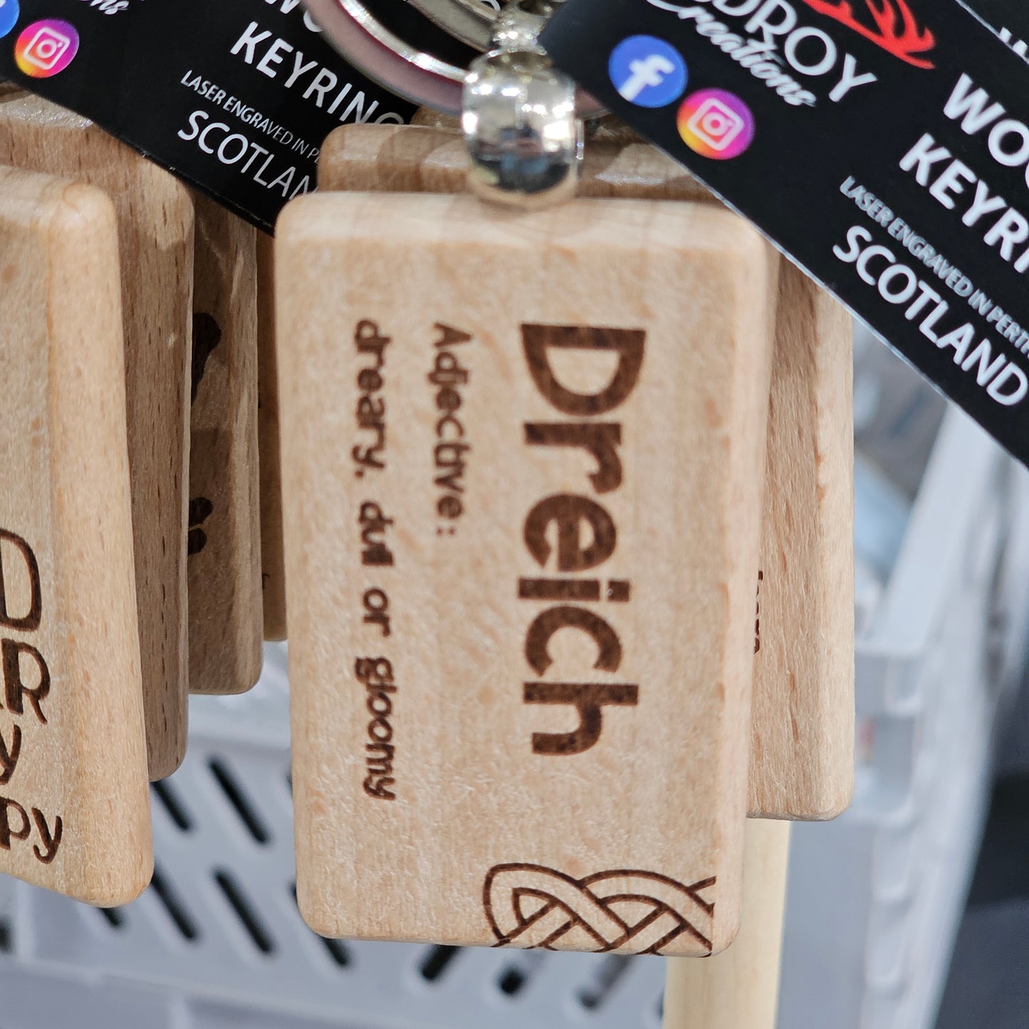 Solid beech wood keyrings by Ardroy Creations with Scottish designs, Scots words and wild swimming slogans