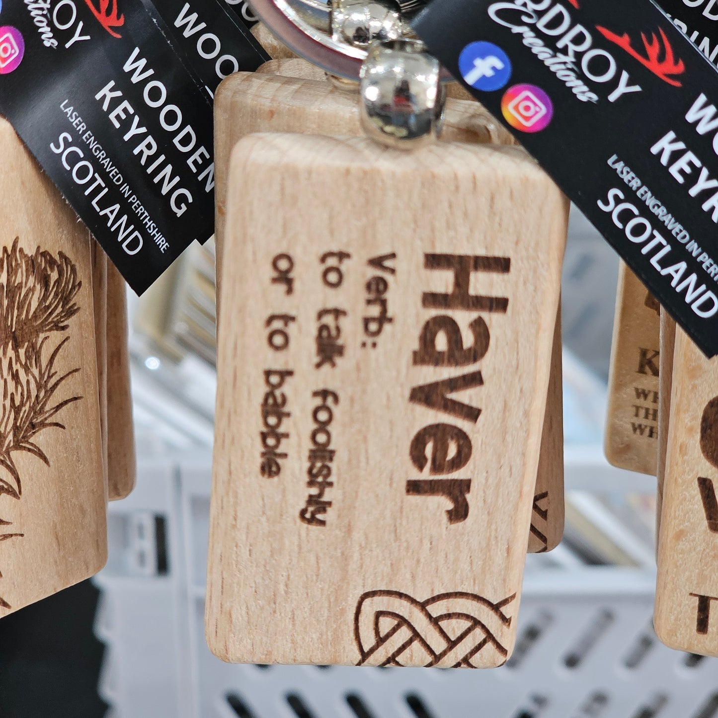 Solid beech wood keyrings by Ardroy Creations with Scottish designs, Scots words and wild swimming slogans