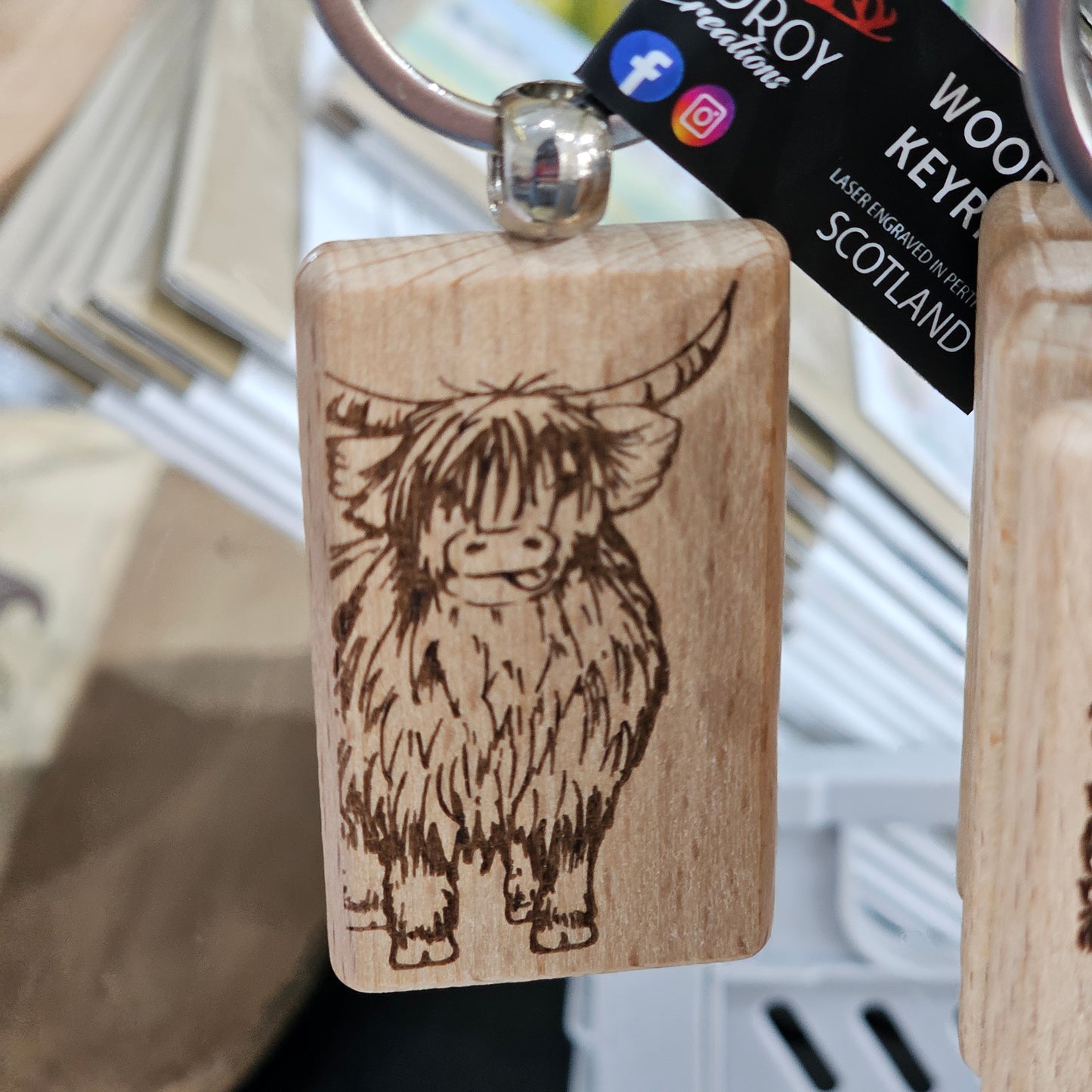 Solid beech wood keyrings by Ardroy Creations with Scottish designs, Scots words and wild swimming slogans