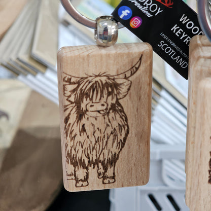 Solid beech wood keyrings by Ardroy Creations with Scottish designs, Scots words and wild swimming slogans