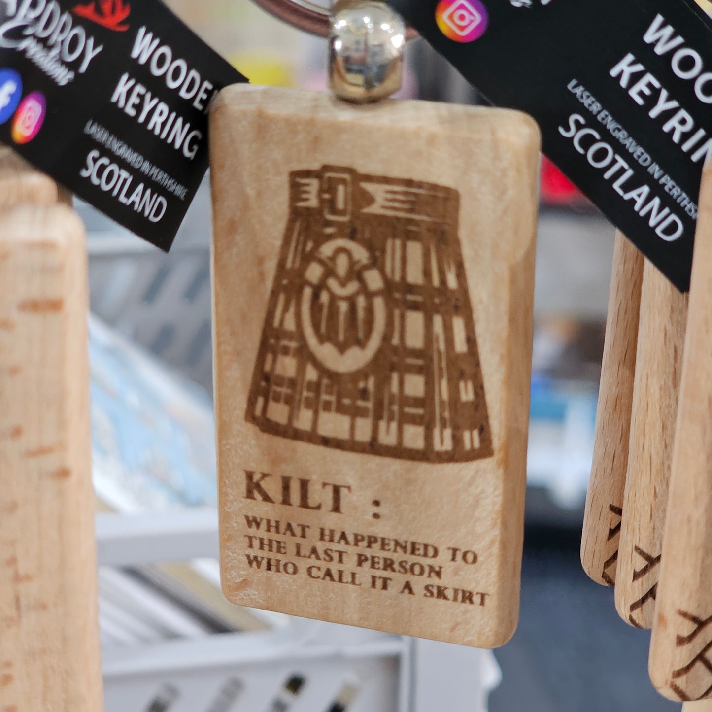 Solid beech wood keyrings by Ardroy Creations with Scottish designs, Scots words and wild swimming slogans