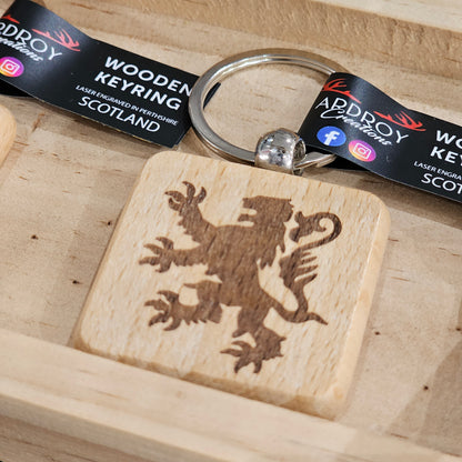 Solid beech wood keyrings by Ardroy Creations with Scottish designs, Scots words and wild swimming slogans