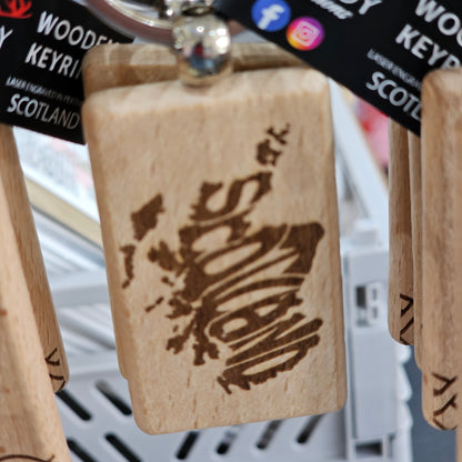 Solid beech wood keyrings by Ardroy Creations with Scottish designs, Scots words and wild swimming slogans