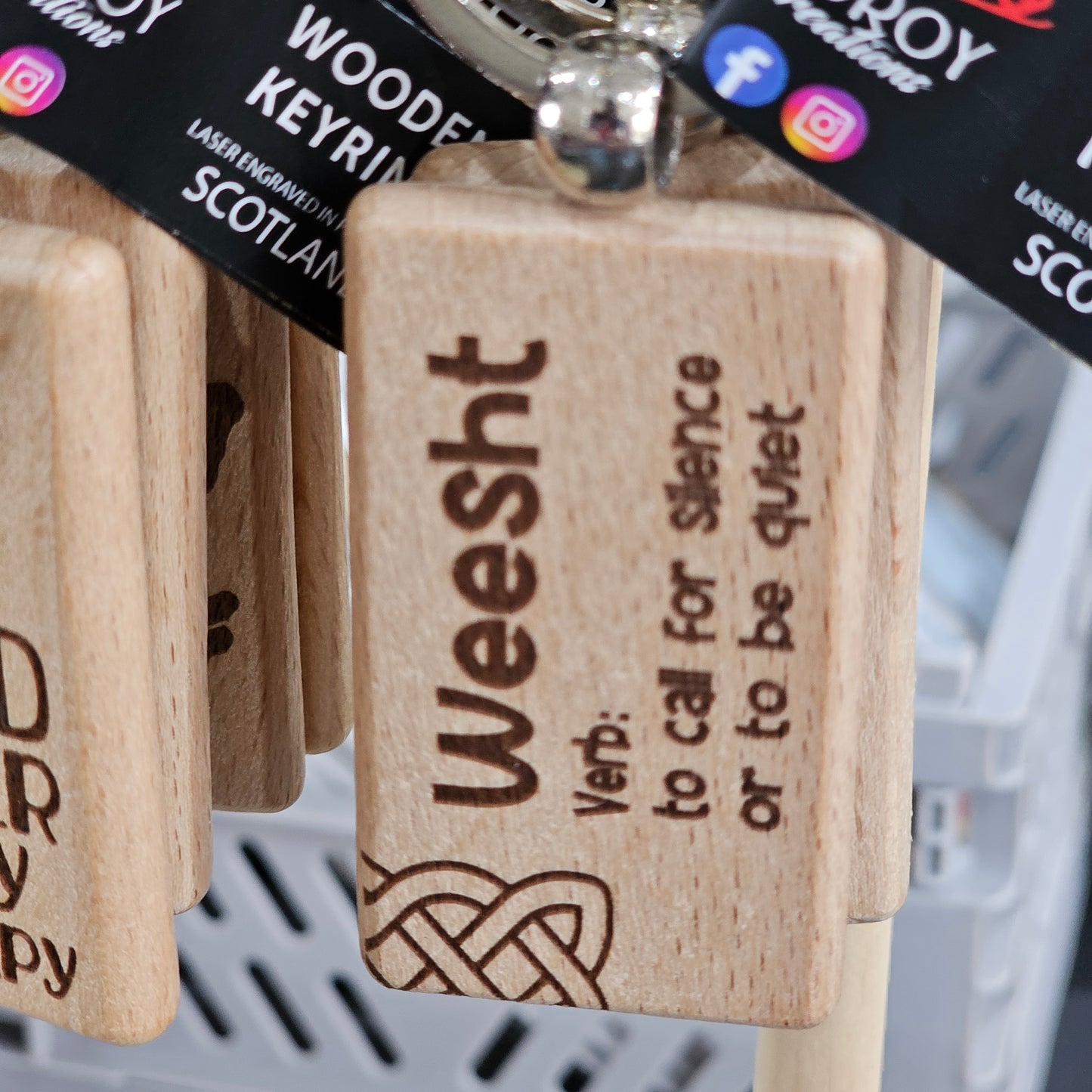 Solid beech wood keyrings by Ardroy Creations with Scottish designs, Scots words and wild swimming slogans