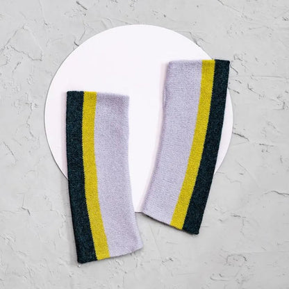 Handmade Scottish lambswool wrist warmers by Lyndsey Currie in a range of beautiful colours