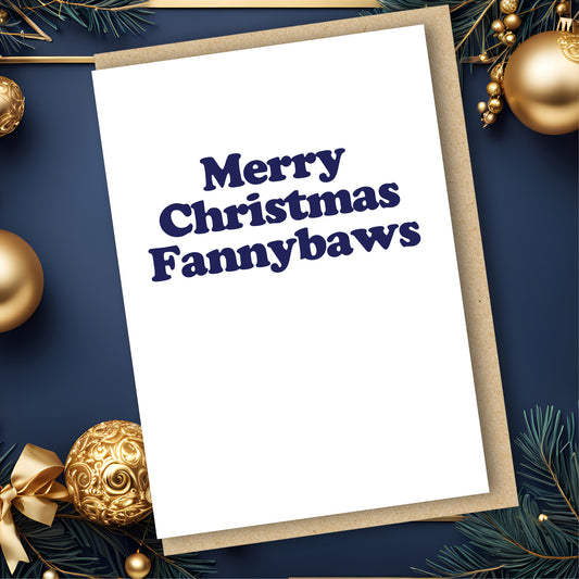 An A6 vertically folded greeting card with the Scottish phrase "Merry Christmas Fannybaws" in a bold, humorous typography style