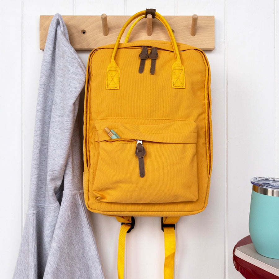 Stylish daily rucksacks with roomy main compartment and double zip, available in Red, Pink, Blue or Yellow