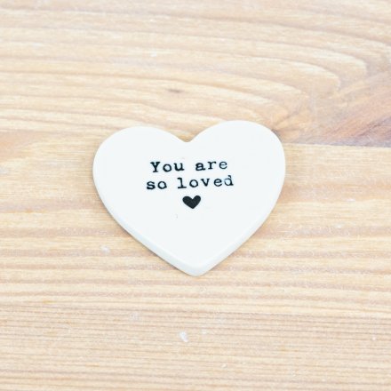 White Heart-shaped ceramic token with 'You are so loved' text
