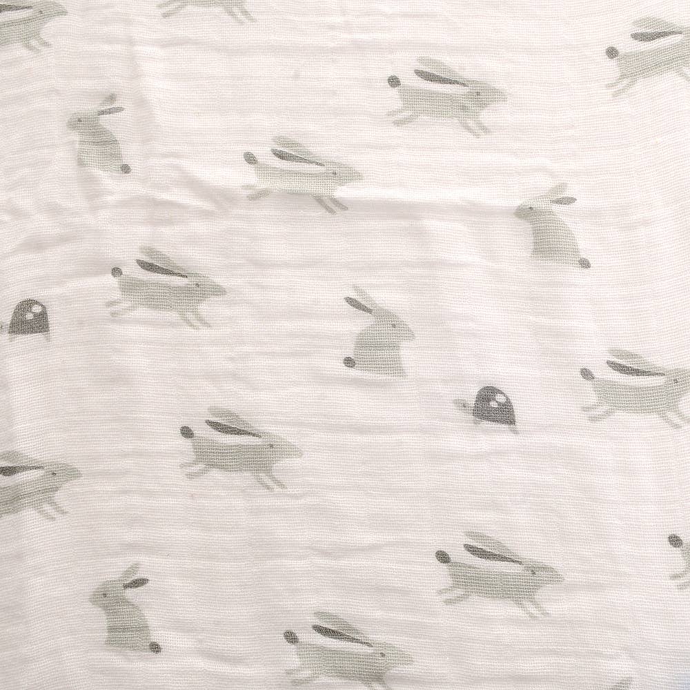 Close up of Cosatto large baby muslin in a subtle Bobtail pattern, made from thick, soft cotton.