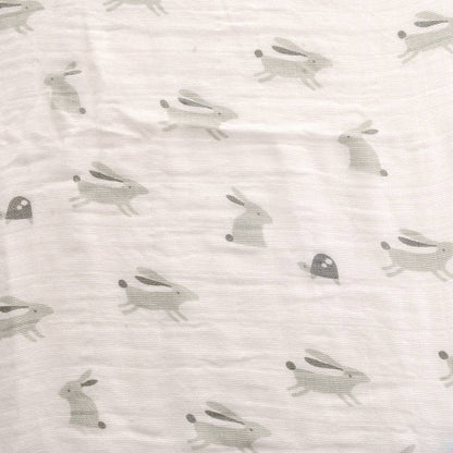 Close up of Cosatto large baby muslin in a subtle Bobtail pattern, made from thick, soft cotton.