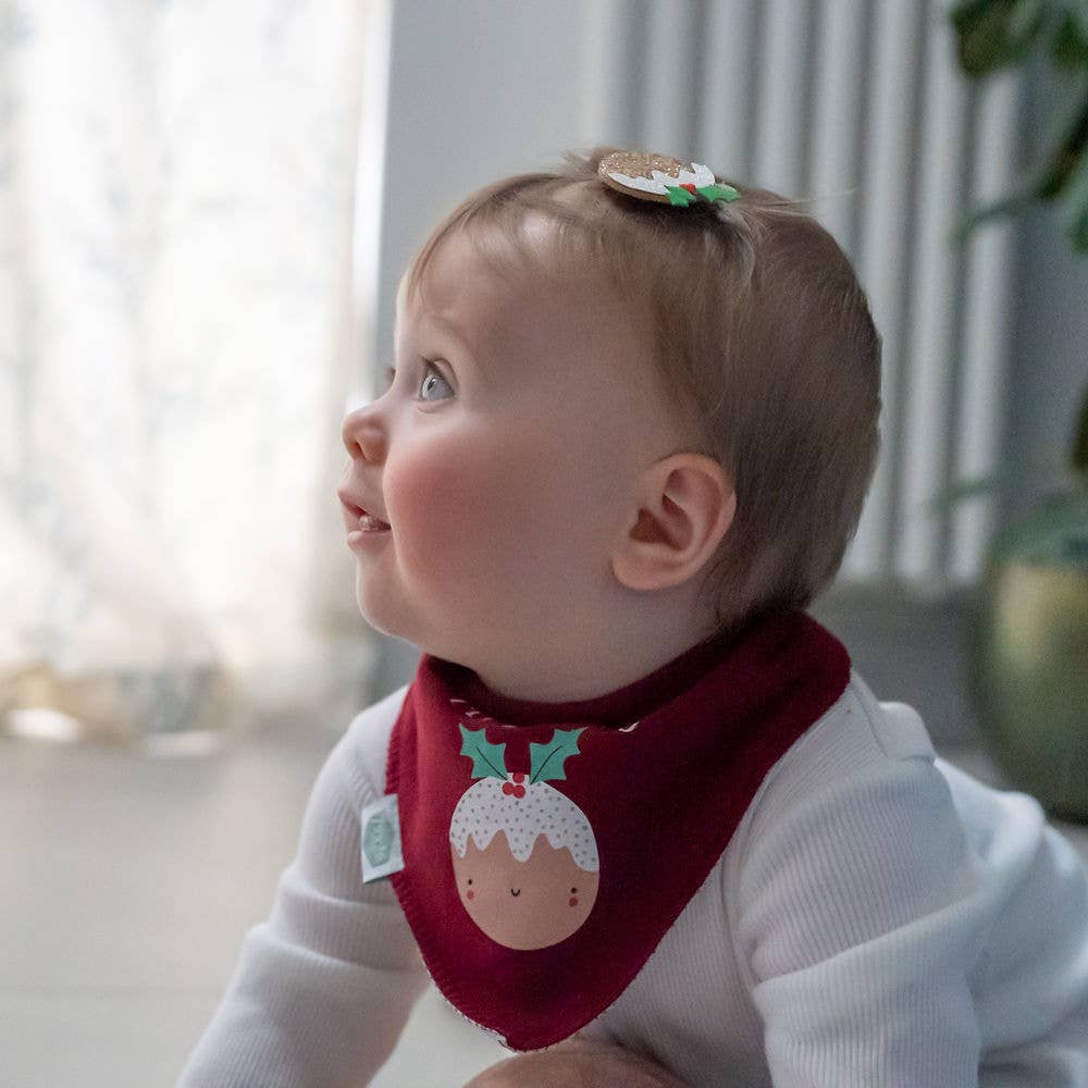 Baby wearing a L'il Pudding red Christmas baby bandana bib