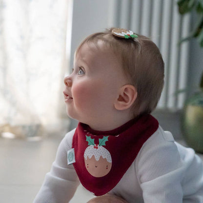 Baby wearing a L'il Pudding red Christmas baby bandana bib