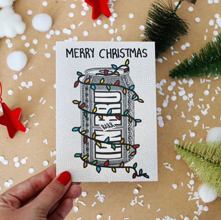 Irn Bru Christmas card by Kilo Papa Studio featuring hand-drawn festive can design on recycled paper with Kraft envelope.