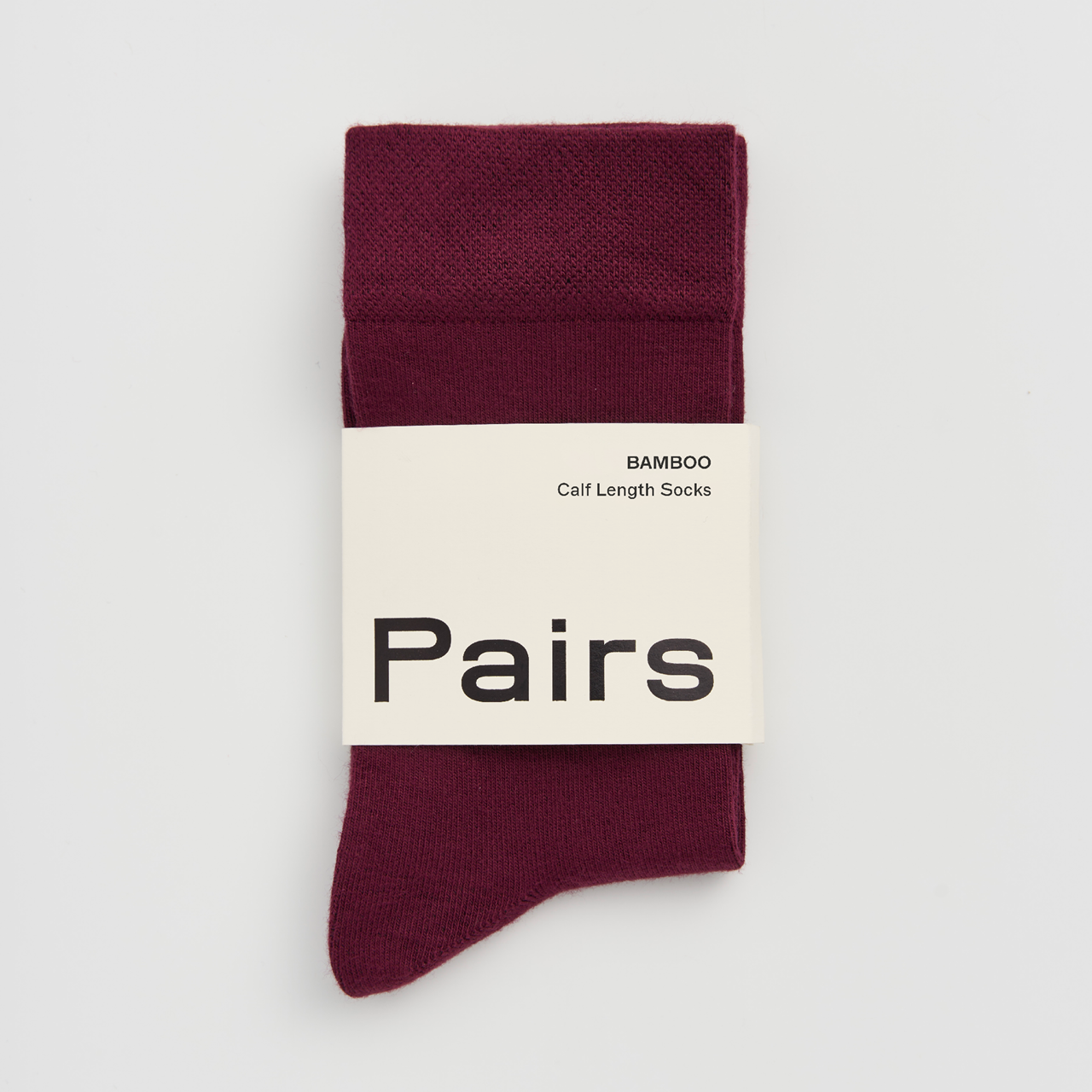 PAIRS Scotland Bamboo socks in Dark Plum highlighting their soft texture.