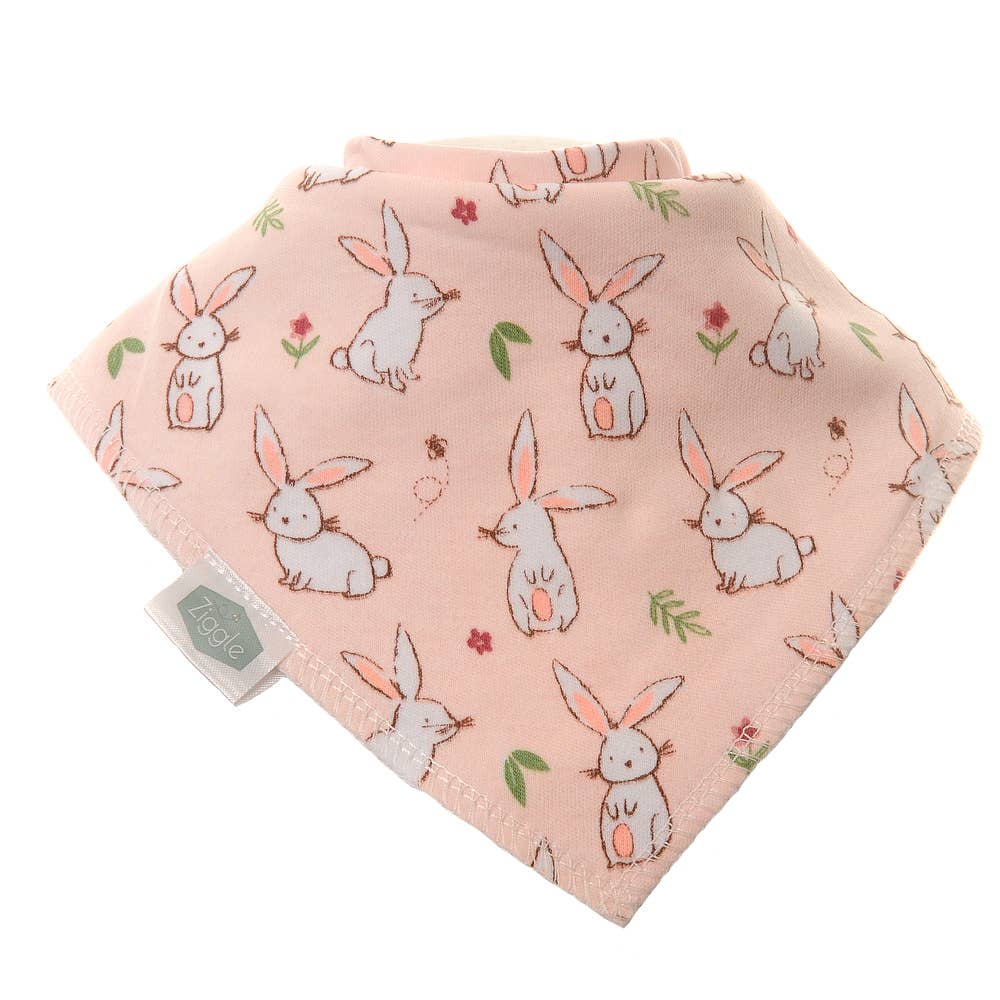 Baby bib with bunny pattern on a pink background