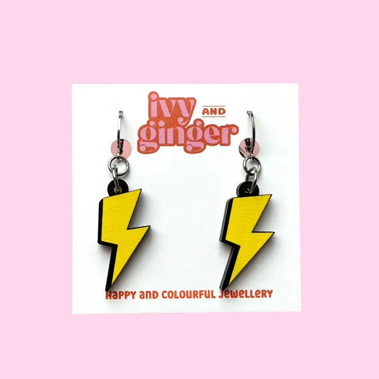 Bright lightning bolt dangle earrings, FSC wood, digital print, lightweight 45mm drop, surgical steel huggie hoops for sensitive ears.