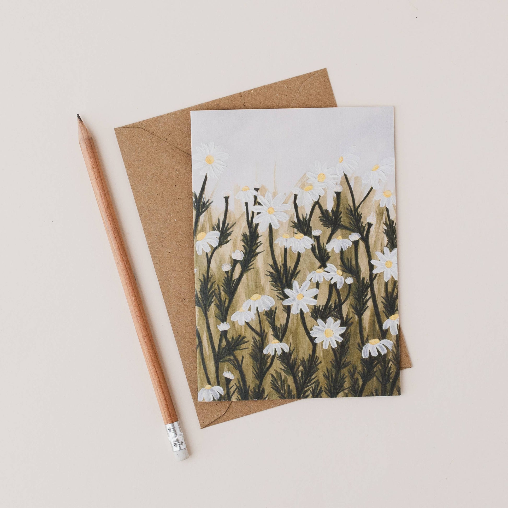 Luxury A6 floral greetings card with mixed media field of daisies illustration, blank inside, recycled Kraft envelope, printed on 350gsm UK card