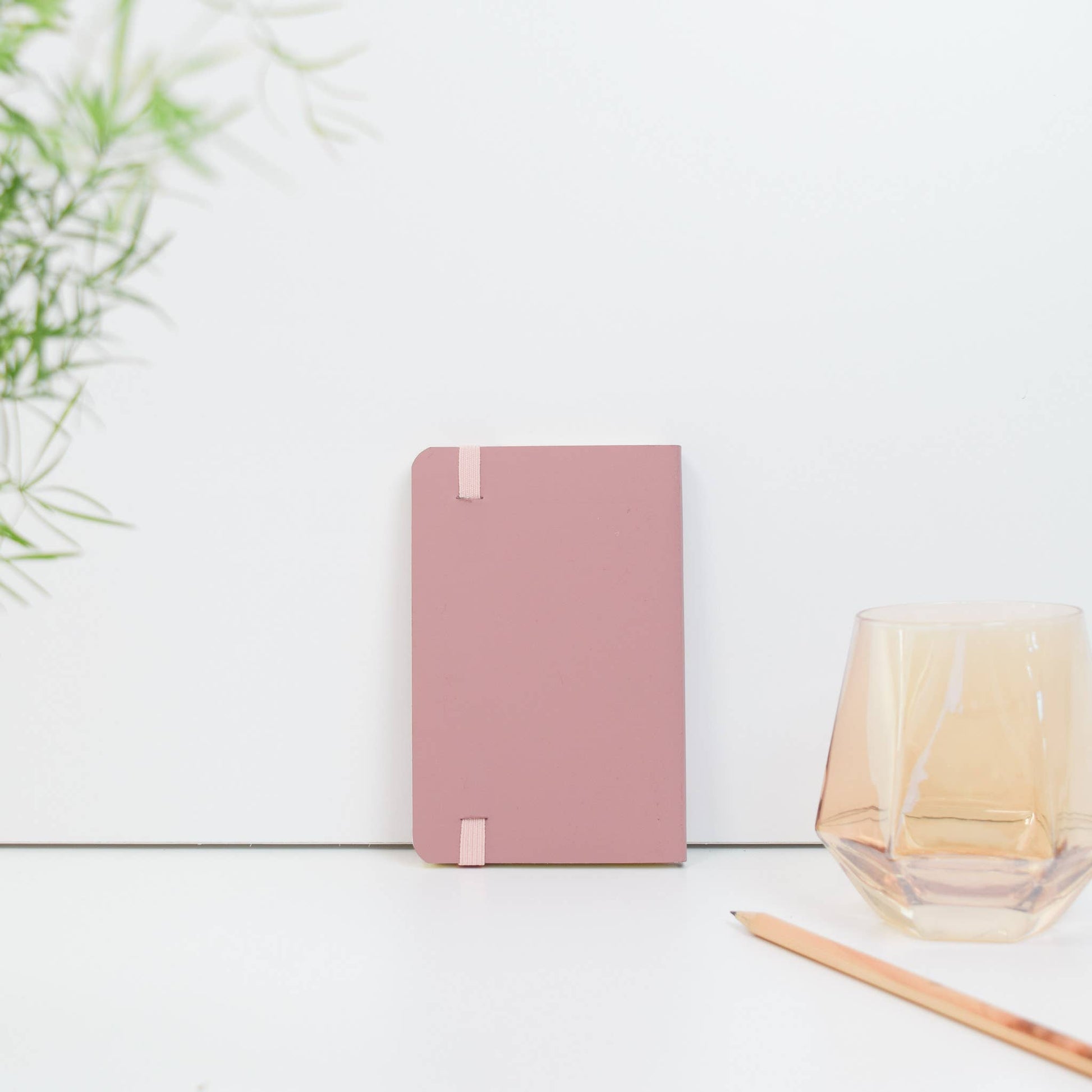 A6 recycled leather pocket notebook with elastic closure in pink