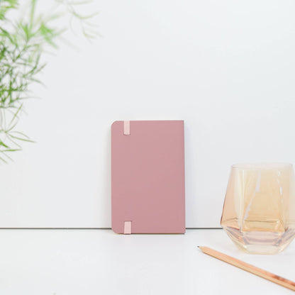 A6 recycled leather pocket notebook with elastic closure in pink