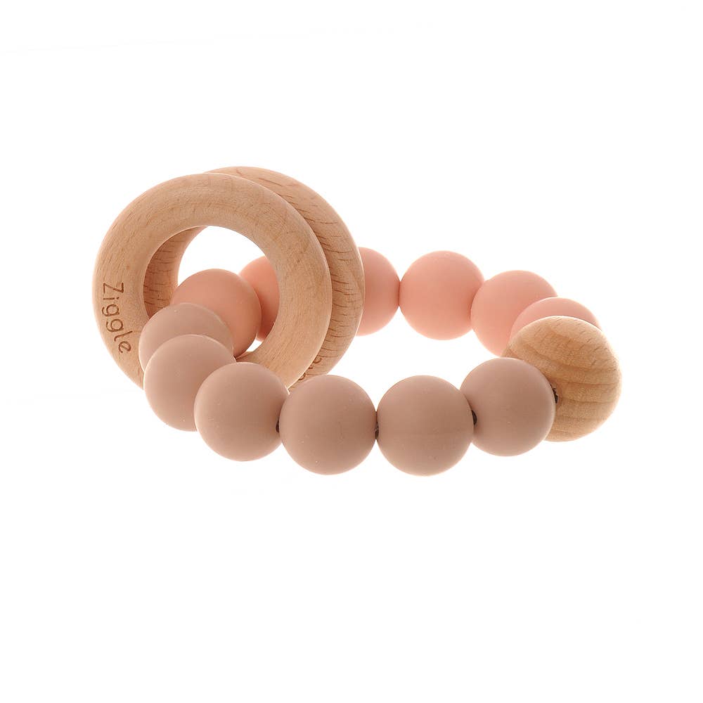 Ziggle natural beech wood baby teether with soft BPA free silicone beads in Blush for soothing teething gums.