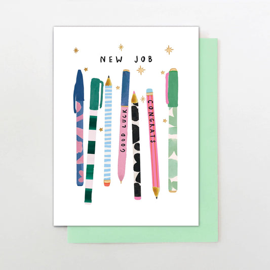 New job card with pen illustrations, green envelope, gold foil, “Good Luck” and “Congrats” pens