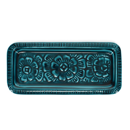 Rectangular teal blue enamel cast metal tray with floral centre and line border, foam pads on base