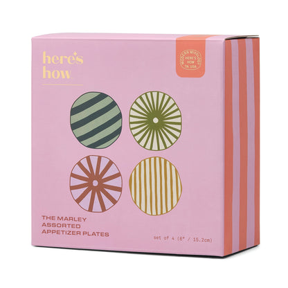 Set of four Marley appetizer plates with bold geometric patterns and vibrant colours, perfect for serving small bites and entertaining in style.