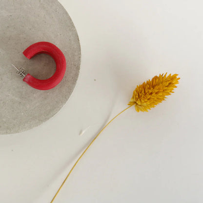 Handmade polymer clay hoop earrings with stainless steel fixtures, lightweight design, various size diameters, perfect for everyday wear.
